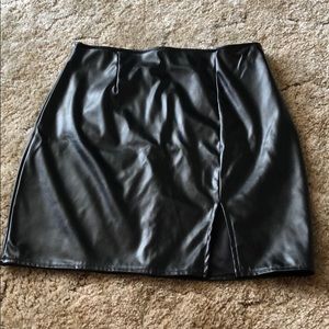Black leather mini skirt